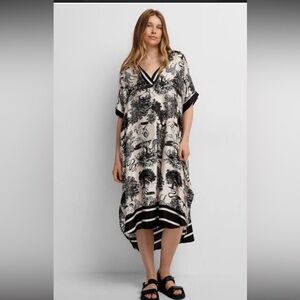 V-Neck Black and Cream High-Low Animal Print Midi Dress